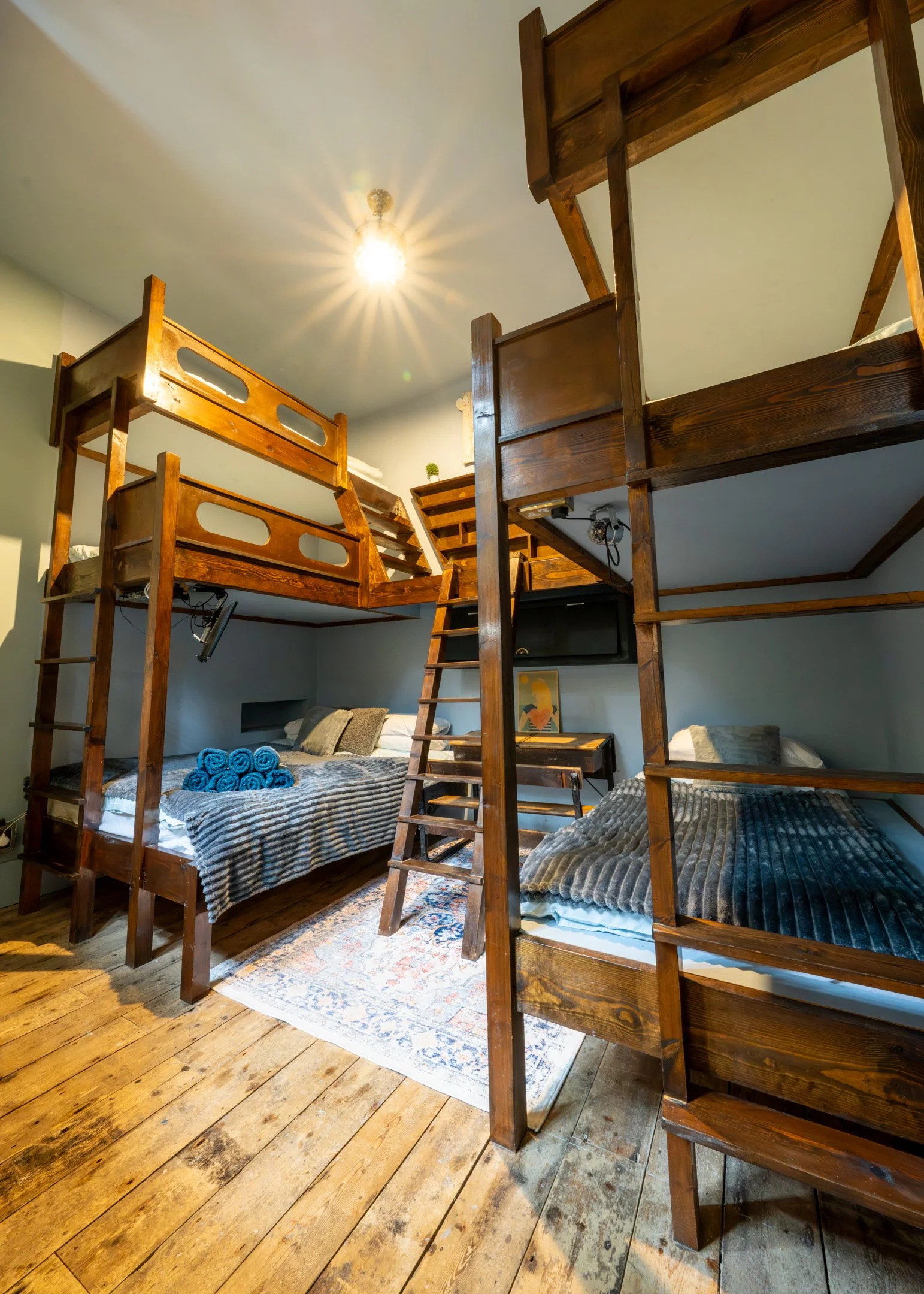 The twin bedroom at The Bath House — custom timber bunk beds for group stays